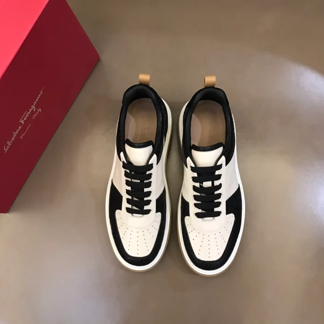 p440 "Salvatore Ferraga**" men's low-top fashion sneakers. This casual shoe has a novel structure and is made of soft calfskin. The contrasting color elements on the upper highlight the bold and avant-garde atmosphere. The first-layer cowhide lining is high-end and comfortable. Energetic and fresh, these shoes can be worn with casual looks or add a touch of street style to elegant trousers.  Size: 38-44